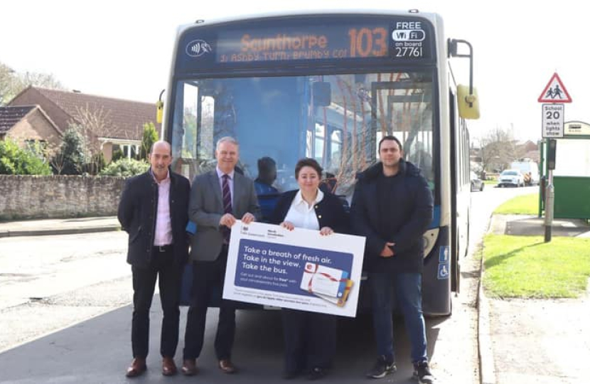 Holly Mumby-Croft MP at a bus stop in Kirton-in-Lindsey
