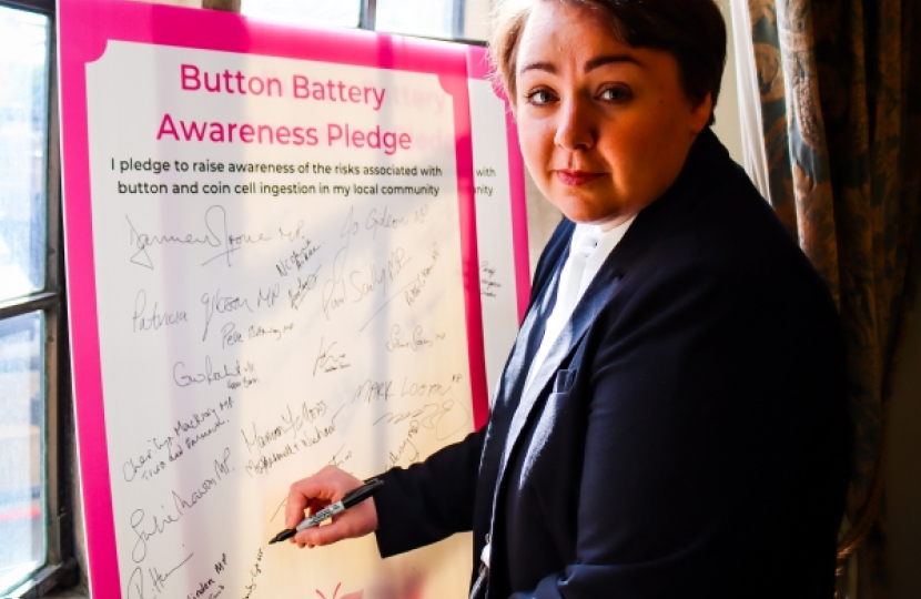 Signing button battery pledge